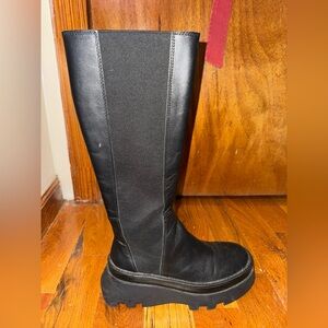 Black leather boots gently worn